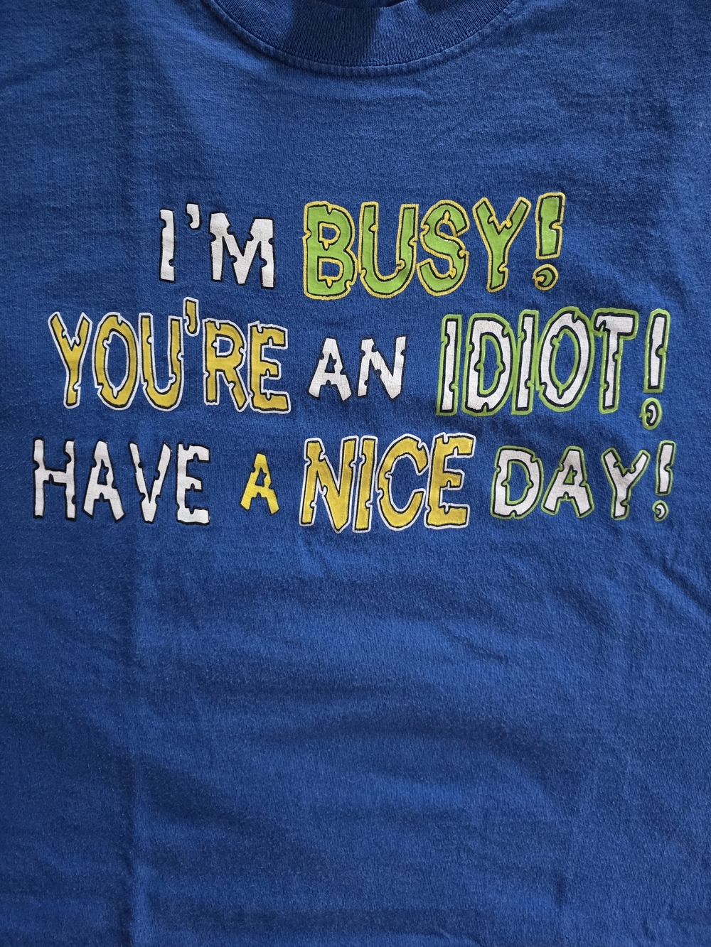 Vintage Y2K 2002 Novelty Men's Blue Short Sleeve Tee with Yellow Graphic